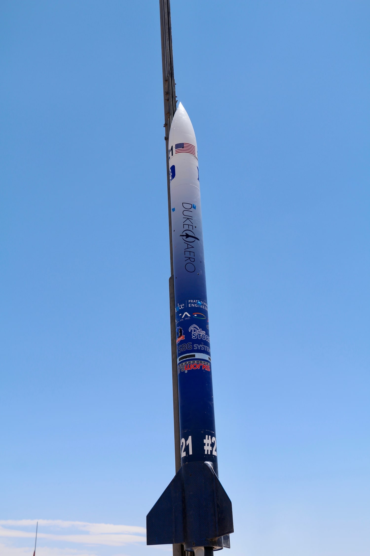 image of rocket on the launch rail, contrasted against the sky