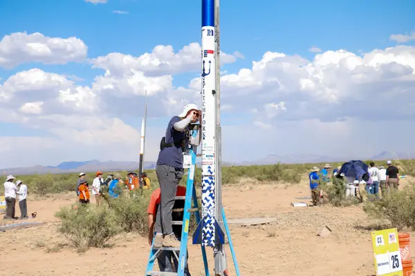 Arming the rocket on the pad.