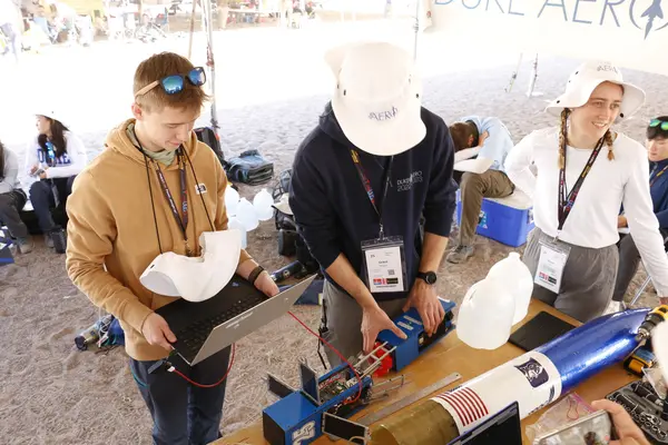 Grant and Charlie working on the payload.